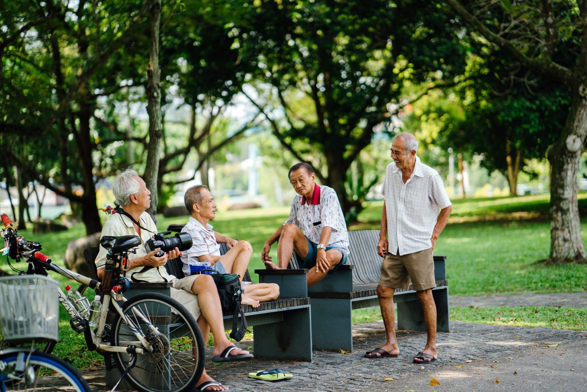 Senior men outside in park